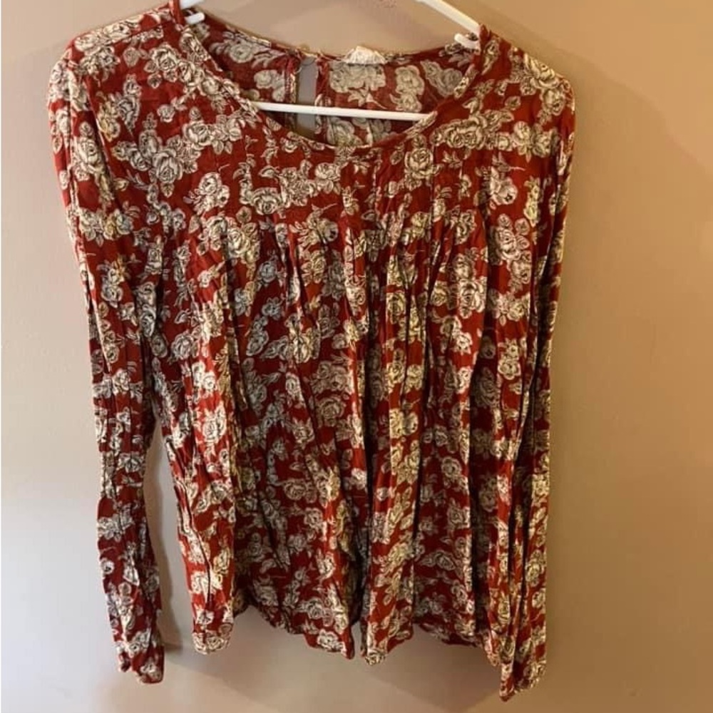 Burnt orange floral blouse